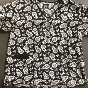 Black and white flower scrub top
